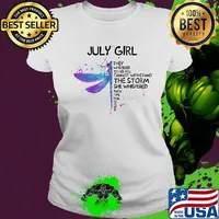 Dragonfly july girl they whispered to her you cannot withstand the storm she whispered back i am the storm s Ladies tee