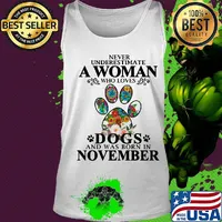 Never underestimate an old woman who loves dogs paw and was born in november s Tank top
