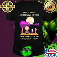 Charlie brown and snoopy once in a while you get shown the light in the strangest of places if you look at it right shirt