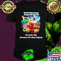 Superhero robots he don't stop playing because he grow old we grow old because we stop playing black shirt