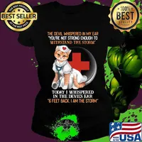Cat nurse the devil whispered in my ear you're strong enough to withstand the storm today i whispered in the devil's ear 6 feet back i am the storm s Ladies tee