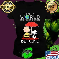 Charlie brown and snoopy in a world where you can be anything be kind s Ladies tee