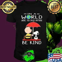 Charlie brown and snoopy in a world where you can be anything be kind shirt