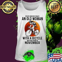 Never underestimate an old woman with a bicycle who was born in november moon blood halloween s Tank top
