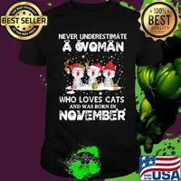 Never underestimate a woman who loves cats and was born in november christmas shirt
