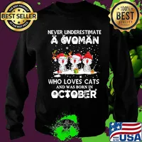 Never underestimate a woman who loves cats and was born in october christmas s Sweater