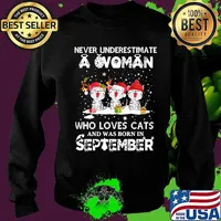 Never underestimate a woman who loves cats and was born in september christmas s Sweater