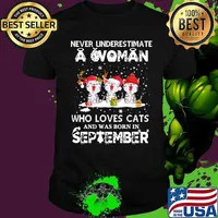 Never underestimate a woman who loves cats and was born in september christmas shirt