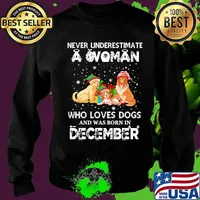 Never underestimate a woman who loves dogs and was born in december christmas s Sweater