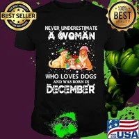Never underestimate a woman who loves dogs and was born in december christmas shirt