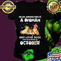 Never underestimate a woman who loves dogs and was born in october christmas s Ladies tee