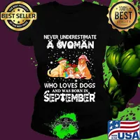 Never underestimate a woman who loves dogs and was born in september christmas s Ladies tee