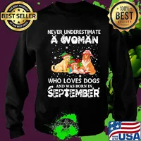 Never underestimate a woman who loves dogs and was born in september christmas s Sweater