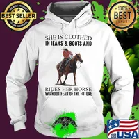 She Is Clothed In Jeans & Boots And Rides Her Horse Without Fear Of The Future Shirt Hoodie