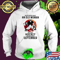 Never underestimate an old woman who loves hockey and was born in September Blood moon Hoodie