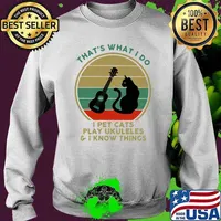 That's what I do I pet cats play ukuleles and I know things Cat and guitar vintage Sweater
