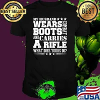 My Husband Wears Boots and carries arifle what does yours do Army Wife T-Shirt