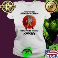 Never underestimate an old woman who loves hiking and was born in october blood moon s Ladies tee
