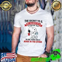 Official The Secret To A Well Balanced Life Is A Cup Of tea In One Hand And A Book In the Other Shirt