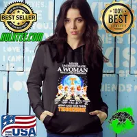 Never underestimate a woman who loves Christmas and her Tennessee Volunteers Hoodie