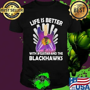Life is better with a guitar and the blackhawks shirt