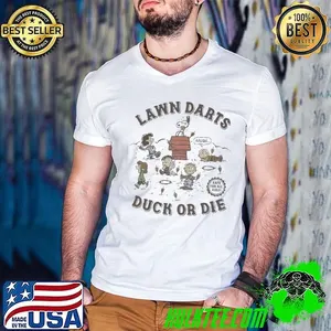 The Peanuts Lawn Darts Duck Or Die 2025 Unisex Shirt